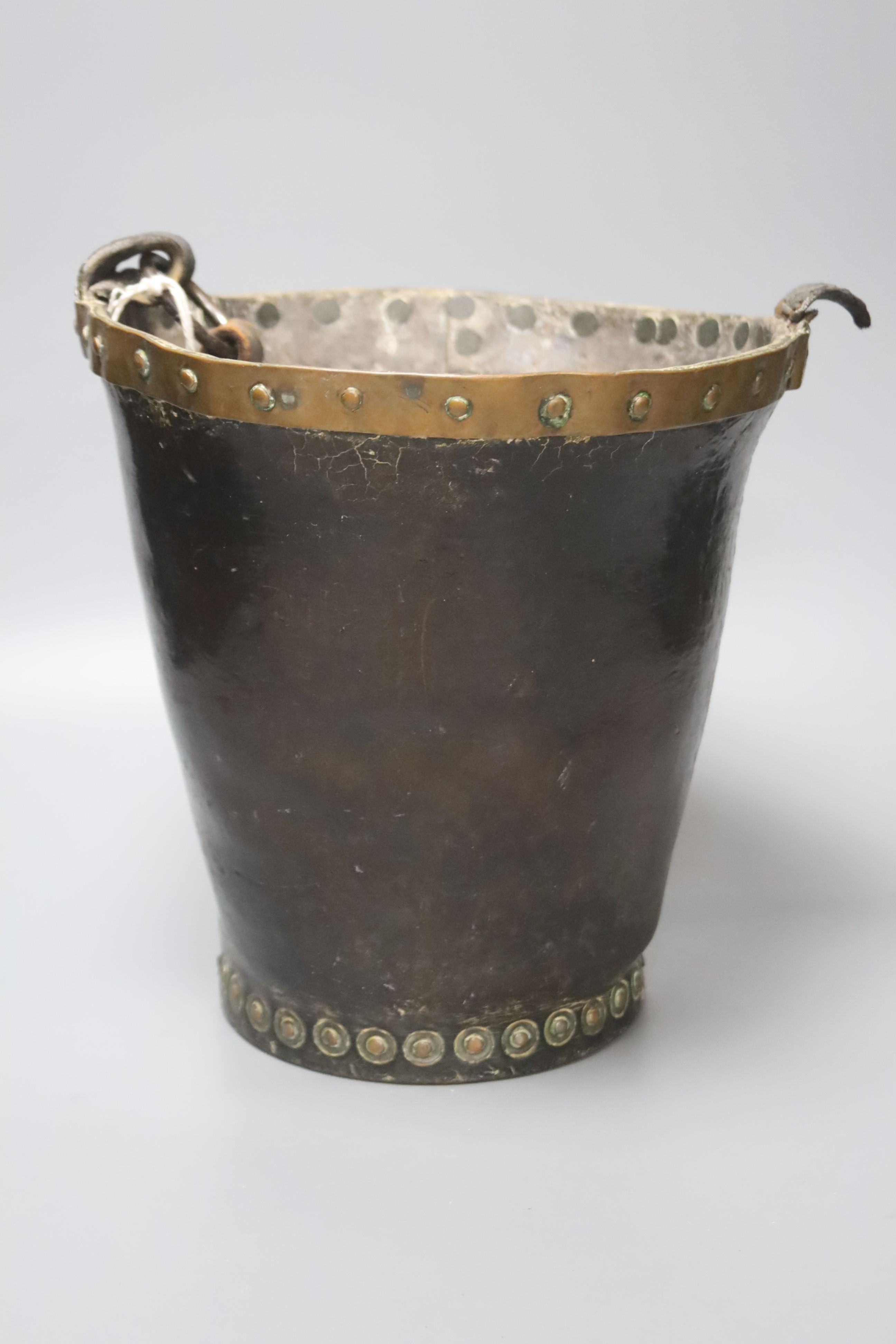 A Victorian leather fire bucket, height 25cm